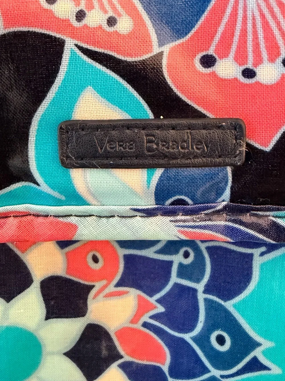Vera Bradley insulated vinyl lunch tote features a vibrant floral mandala